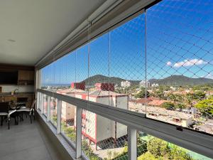 Apartamento em Bertioga com varanda gourmet