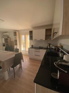 Face à la mer avec clim, wifi, parking