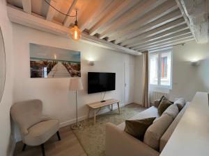 Appartements Bella YourHostHelper : photos des chambres