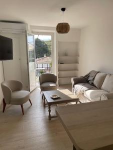 Appartements Duplex place des lices : photos des chambres