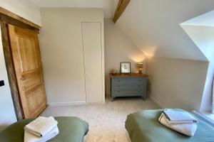 Maisons de vacances Beautiful Farmhouse - 1h40 South Paris : photos des chambres