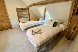 Maisons de vacances Beautiful Farmhouse - 1h40 South Paris : photos des chambres