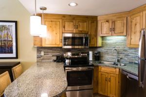 Come Golf or Ski In Out at this best location