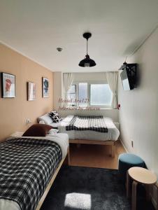 Phòng Hai Giường Đơn Loại Sang (Deluxe Twin Room)