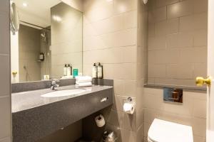 King Suite with Sofa Bed room in Holiday Inn London Sutton an IHG Hotel