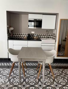 Appartements Le bonheur de la campagne a la ville - Grand studio en plein coeur de la ville : photos des chambres