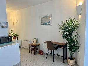 Appartements Appartement au calme - Proche centre ville : photos des chambres