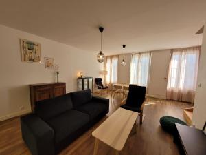 Appartements Duplex cosy & lumineux en plein centre bourg : photos des chambres