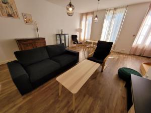 Appartements Duplex cosy & lumineux en plein centre bourg : photos des chambres