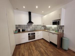 Appartements Duplex cosy & lumineux en plein centre bourg : photos des chambres