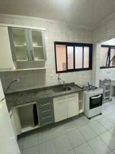 Pé na areia praia da Guilhermina III