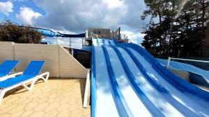 Maisons de vacances Bungalow de 3 chambres avec piscine partagee terrasse et wifi a Saint Jean de Monts a 3 km de la plage : photos des chambres