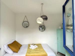 Appartements L'holiday - YourHostHelper : photos des chambres