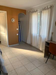 Maisons d'hotes Les Palmiers : photos des chambres