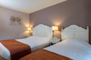 Hotels Hotel Village Motel : photos des chambres