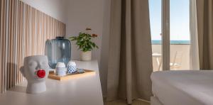 Doppelzimmer mit Balkon und Meerblick
