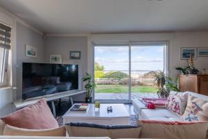 Maisons de vacances La Maree - Face a la mer et avec piscine privee : photos des chambres