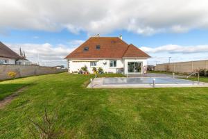 Maisons de vacances La Maree - Face a la mer et avec piscine privee : photos des chambres