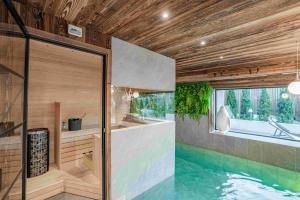 Villas Serre-Chevalier Chalet Orpin piscine cinema sauna : photos des chambres