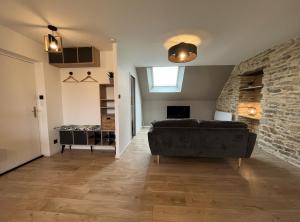 Appartements Les Pierres de Symphorien - parking gratuit : photos des chambres