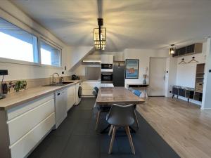 Appartements Les Pierres de Symphorien - parking gratuit : photos des chambres
