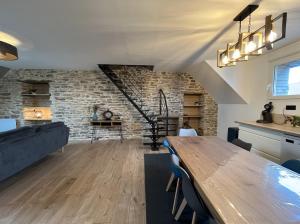 Appartements Les Pierres de Symphorien - parking gratuit : photos des chambres