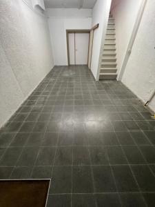 Ruim app. met grote garage