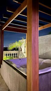 Cobertura de 3 quartos com hidromassagem e vista do por-do-sol