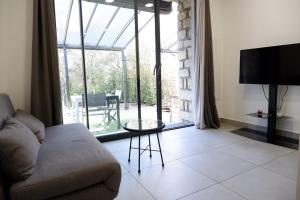 Appartements N7 Charmant T2 avec jacuzzi prive : photos des chambres