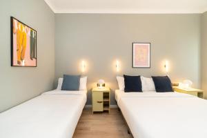 Santini Apartment by Olala Homes