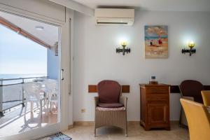 AT065 Primera línea de la playa, airco y aparcamiento privado