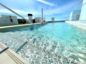 GATU PREMIUM Sandia Beach lujo junto al mar, parking y piscina común," Preferente mayores de 21 años y familias "