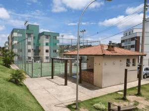 Condomínio encantador com estacionamento