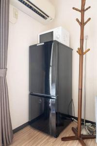 Sanacion Motomachi 6 なんば徒歩圏内 Netflix視聴可能 2部屋セット貸しでプライベートも確保