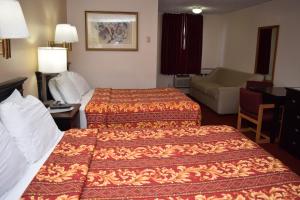 Deluxe Queen Room room in Knights Inn Oswego East