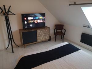 Appartements Un instant avec vous : photos des chambres