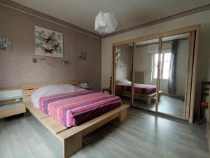 Appartements Logis le 18 rose : photos des chambres