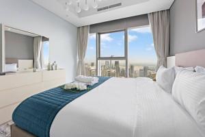 StoneTree - Paramount Tower Hotel & Residences 2 BR - Infinity Pool & Stunning View