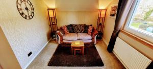 Self catering upper floor flat at Woodend house