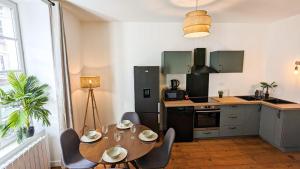 Appartements Cosy Calypso - 6 pers - Hypercentre - Grande place de parking - WIfi haut debit : photos des chambres