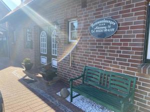 Ferien im Wangerland Ferienwohnung LEUCHTTURM Minsen Schillig Hund Pool Sauna