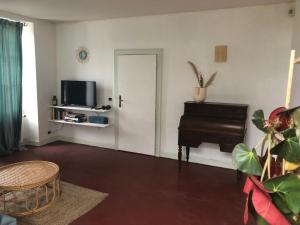 Maisons d'hotes Bel appartement et jardin chez Maison Devaux : photos des chambres