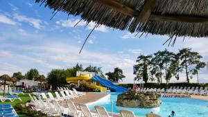 Maisons de vacances Bungalow de 2 chambres avec piscine partagee et jardin amenage a Onzain : photos des chambres