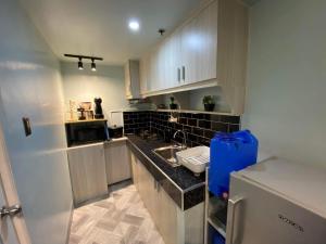 The PAD Staycation 2BR Condo with PS4, Netflix, WIFI