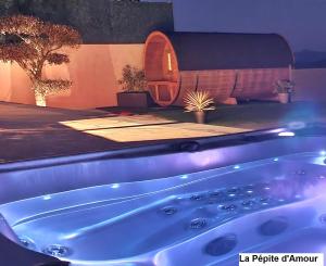 Villas La Pepite d'Amour, spa, sauna, piscine a volonte ! : photos des chambres