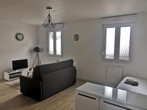 Appartements Le Chaleureux, accueillant, gare, parking gratuit : photos des chambres