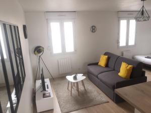 Appartements Le Chaleureux, accueillant, gare, parking gratuit : photos des chambres