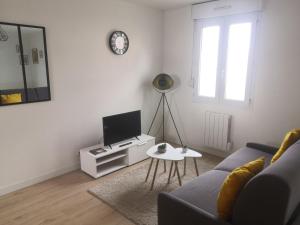 Appartements Le Chaleureux, accueillant, gare, parking gratuit : photos des chambres