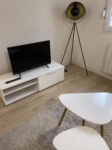 Appartements Le Chaleureux, accueillant, gare, parking gratuit : photos des chambres