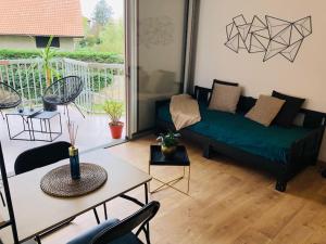 Appartements Studio Moderne, Terrasse et Parking : photos des chambres